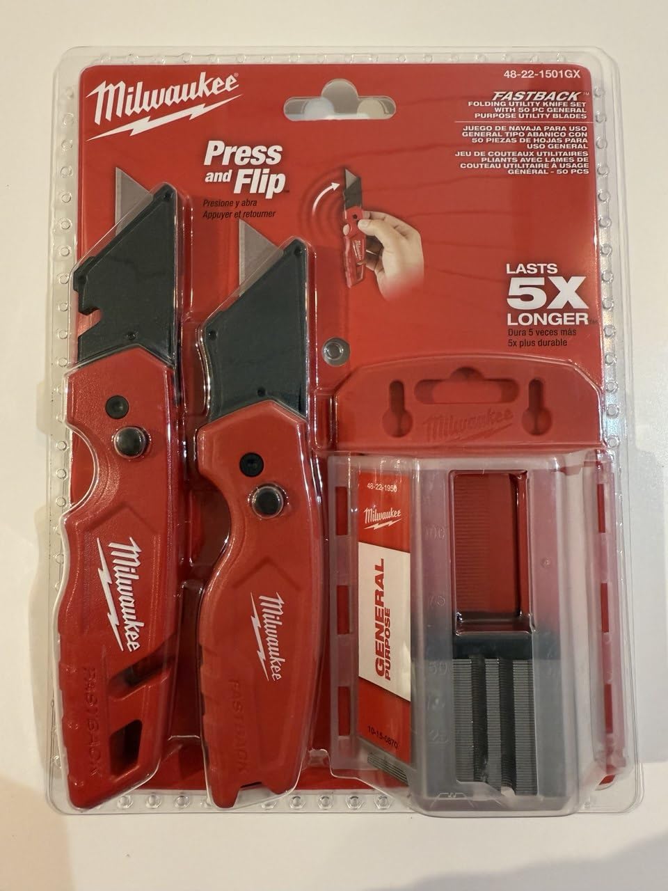 Milwaukee knife with wireframe belt hook enables quick tool access.