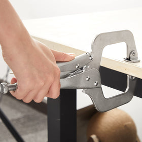 Minatee locking C-clamp quick-release handle demonstrated for easy release
