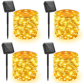 Minetom four-pack solar string lights illuminate outdoor patio with 132 ft warm white LEDs