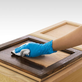 Minwax Pre-Stain Conditioner bottle prepared for even color.