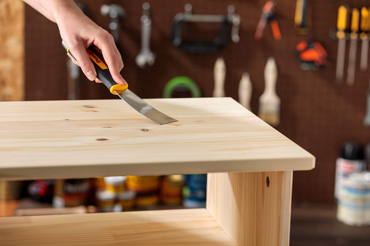 Minwax stainable wood filler layered to dry for deeper holes.