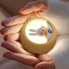 MIPOW Miffy night light in AUTO mode lighting a hallway