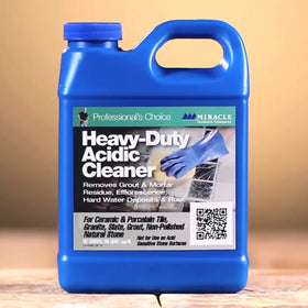 Miracle Sealants acidic cleaner applied on tile surface for grime removal.