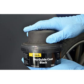 Mirka Dry Guide Coat Black shown with hand block for masking-free prep
