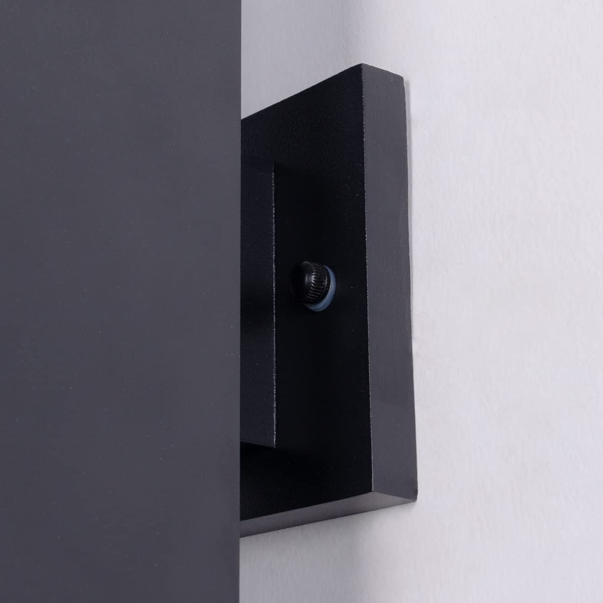Mirrea wall light supports E26 base bulbs for flexible brightness choices.