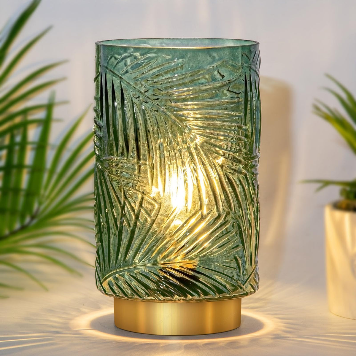 MJ PREMIER leaf-vein glass lamp casting warm glow for living spaces