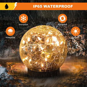MLKNK cracked glass ball lawn decor adds sparkling focal point at night.