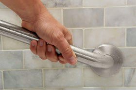 Stainless finish coordinates with Moen bathroom hardware and resists corrosion.