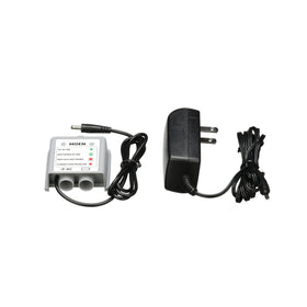Moen AC adapter attached to MotionSense control box for uninterrupted faucet operation.