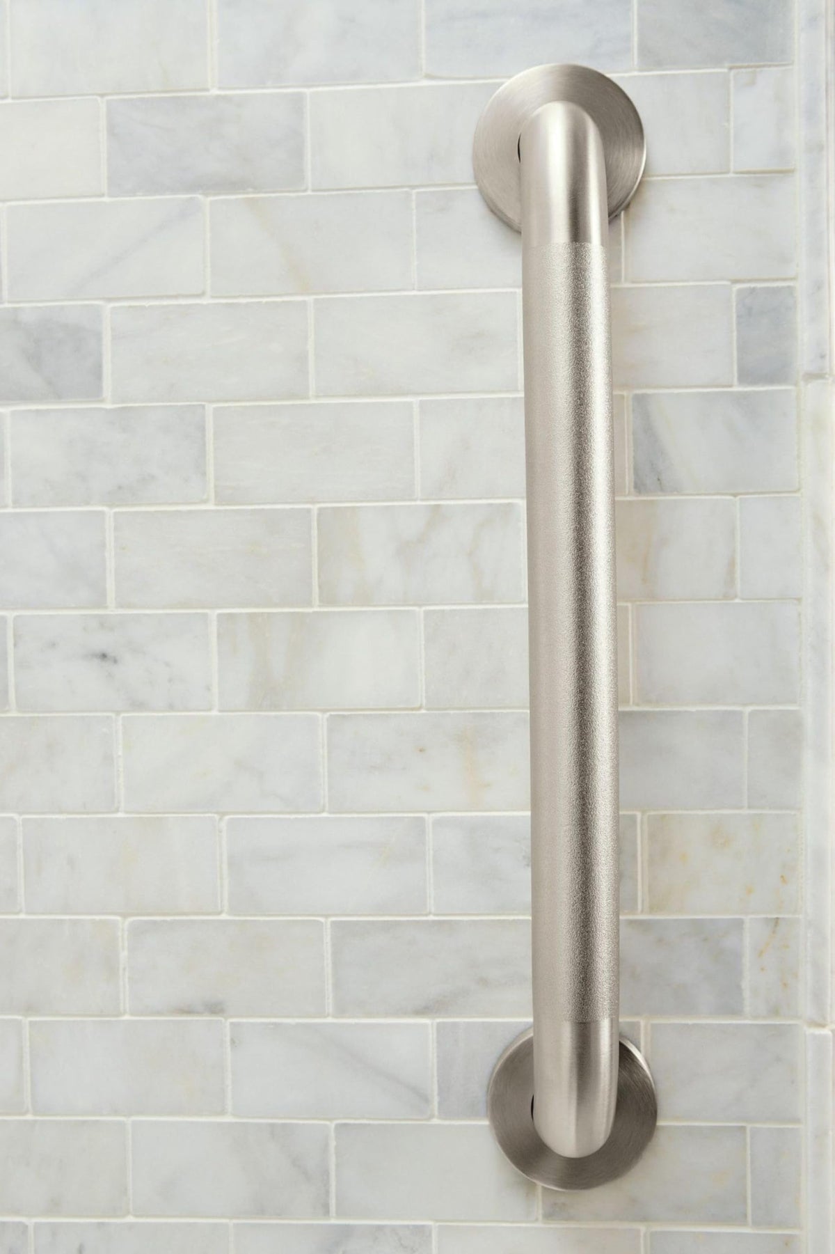 Moen ADA-compliant bathroom handrail aiding accessibility in tub or shower