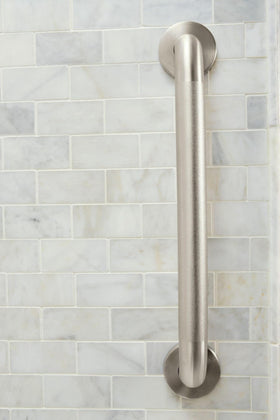 Moen ADA-compliant bathroom handrail aiding accessibility in tub or shower