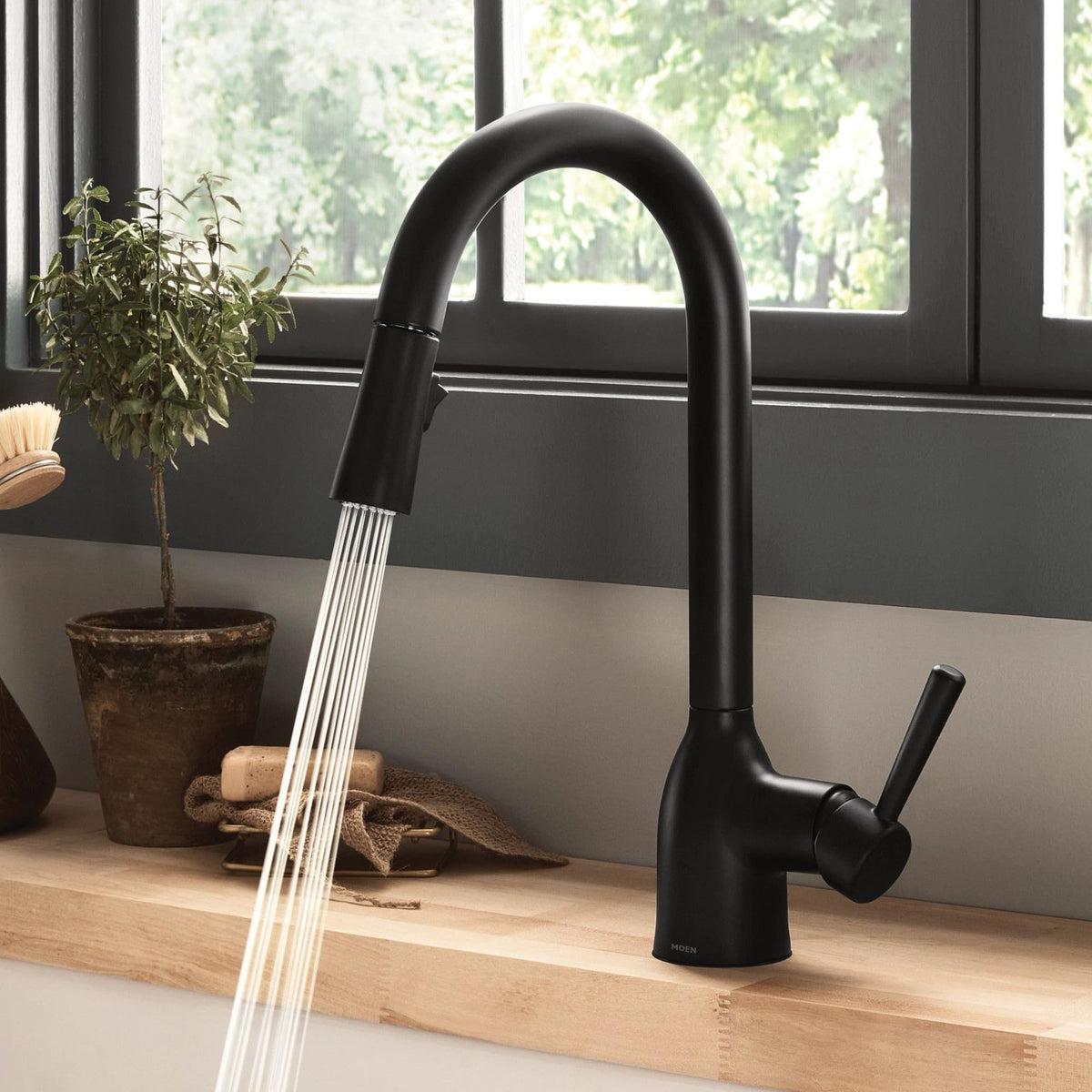 Moen Adler single-handle control simplifies temperature and flow management.