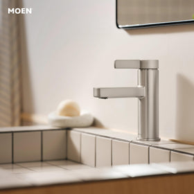 Moen Beric handle close-up shows smooth one-handle control for quick temperature adjustment.