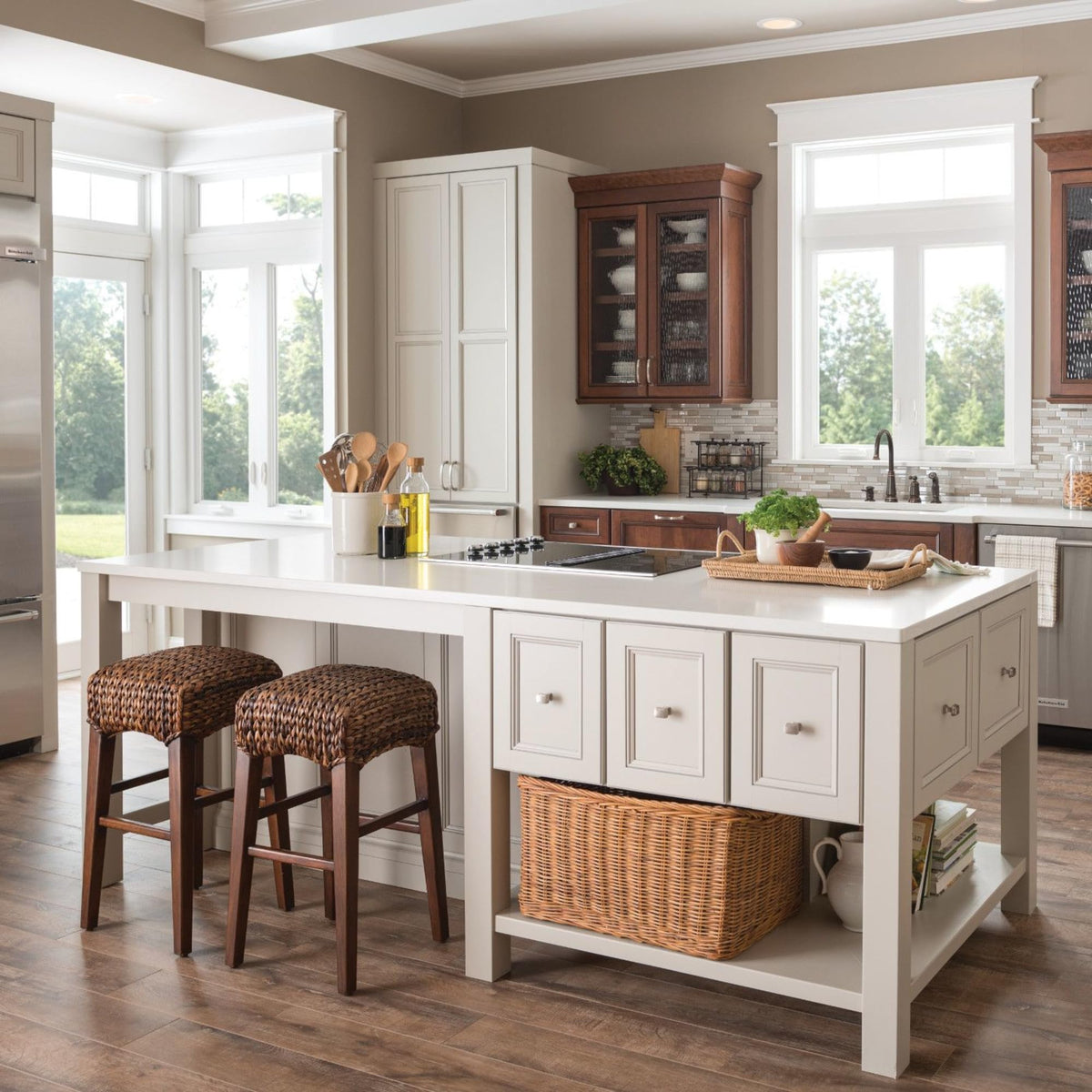 Moen bronze kitchen faucet with coordinated dispenser.