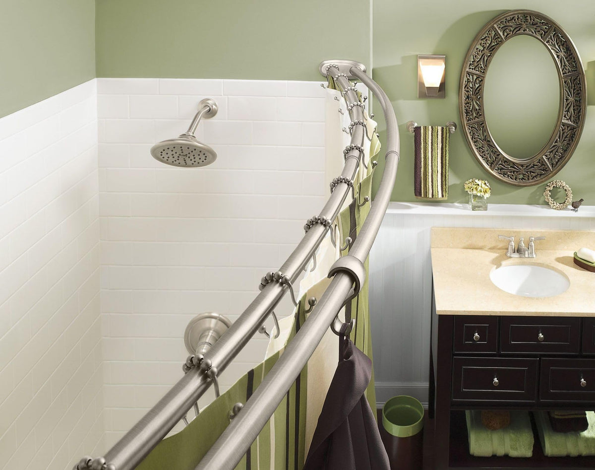 Moen curved shower rod highlighting towel hanging space in a bath