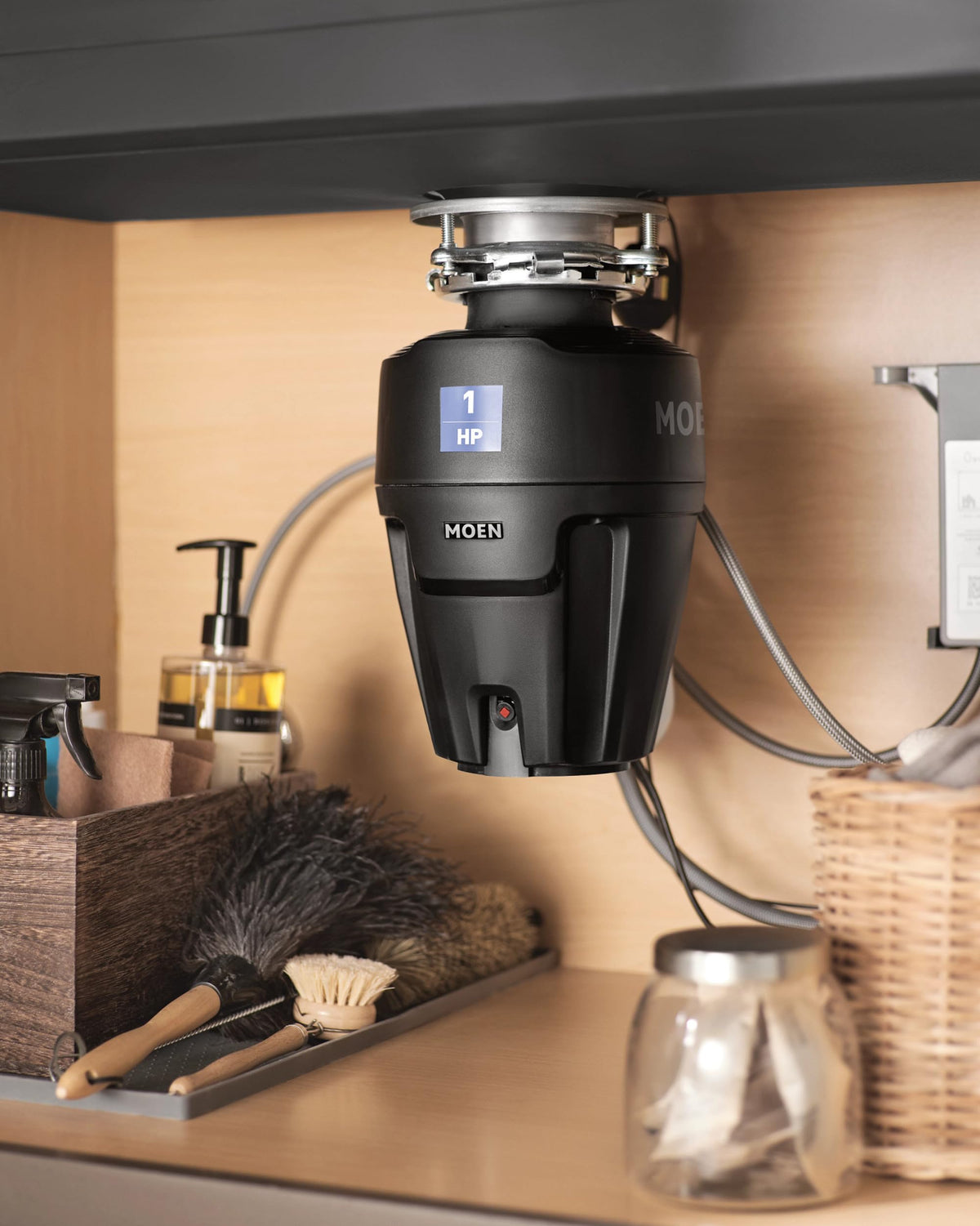 Durable steel grinding chamber inside Moen Chef EX100C.