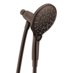Moen Engage Magnetix showerhead in oil rubbed bronze shown from an angle, highlighting finish and design.