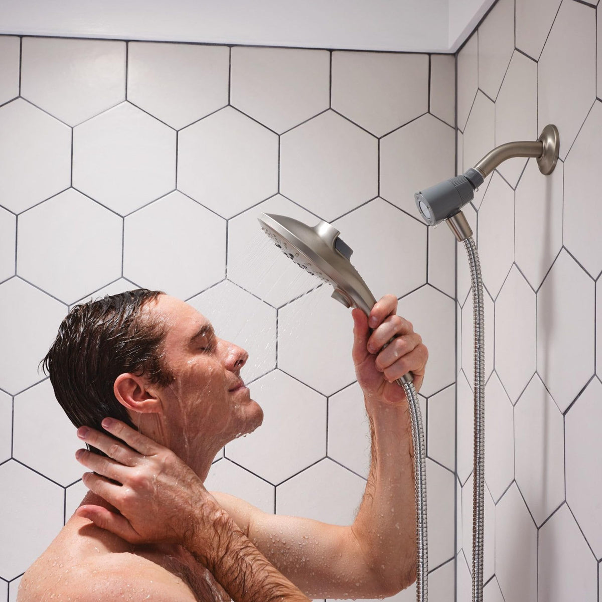 Moen Engage Showerhead complements modern bathrooms with a sleek design and efficiency.