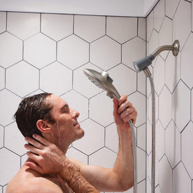 Moen Engage Showerhead complements modern bathrooms with a sleek design and efficiency.