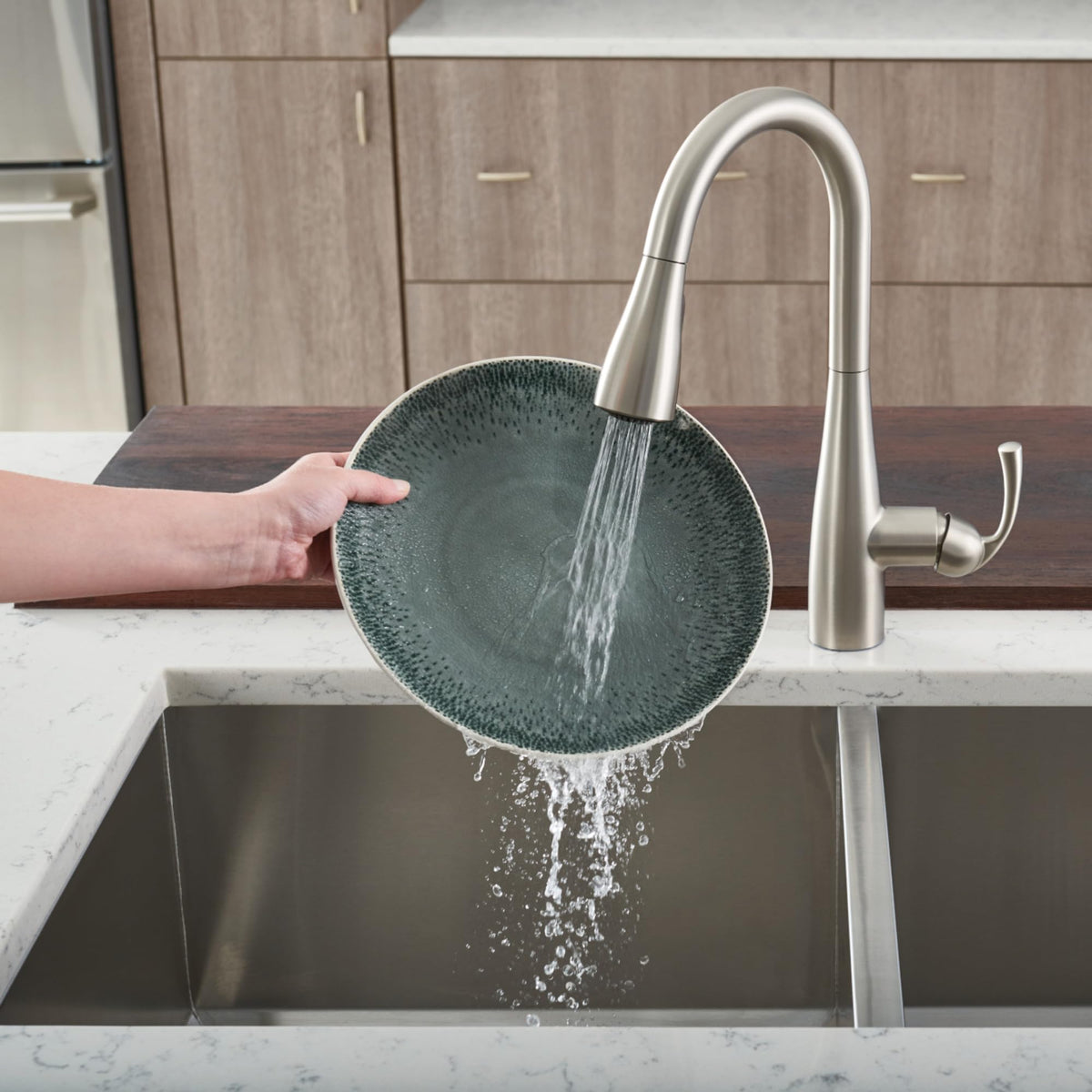 Moen Essie modern kitchen design with sleek stainless look.