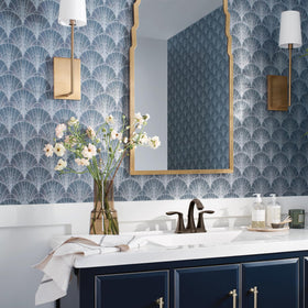 Moen Eva finish close-up with warm light accents for a classic look