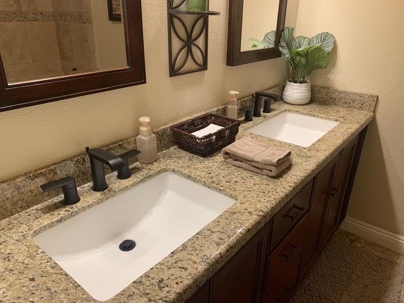 Moen Genta 84763BL mounting hardware for easy installation.