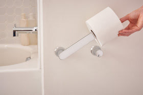 Moen Genta LX coordinating collection image highlights cohesive bathroom style.