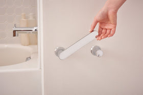 Modern bathroom styling with Moen Genta LX for a clean, uncluttered look.