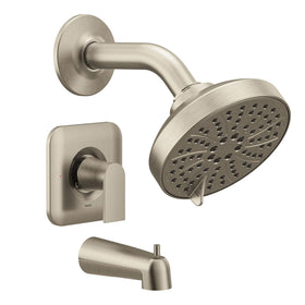 Moen Genta LX showerhead in brushed nickel delivering steady water flow.