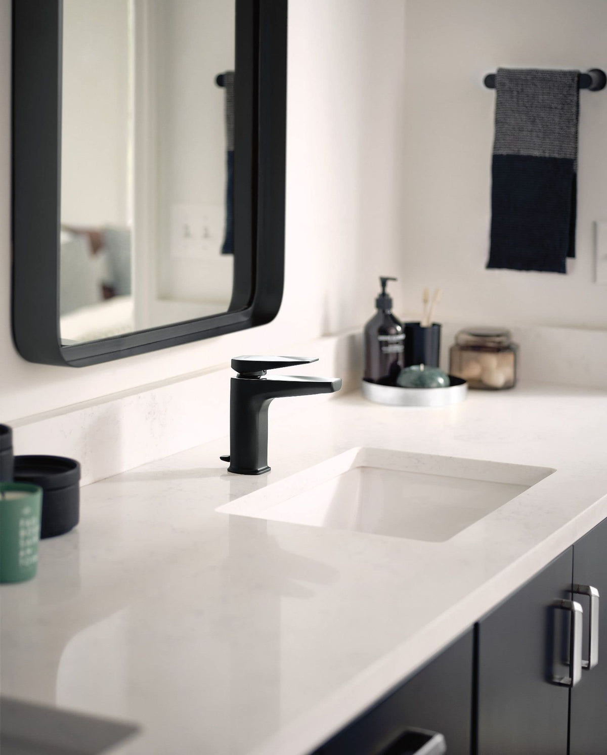Moen Genta LX wall-mount towel bar with modern silhouette for bathrooms