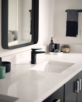 Moen Genta LX wall-mount towel bar with modern silhouette for bathrooms