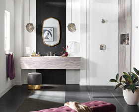Moen Genta LX towel hook in brushed nickel for quick bathroom organization.