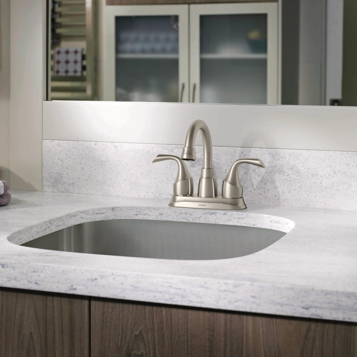 Moen Idora drain assembly included for complete installation.
