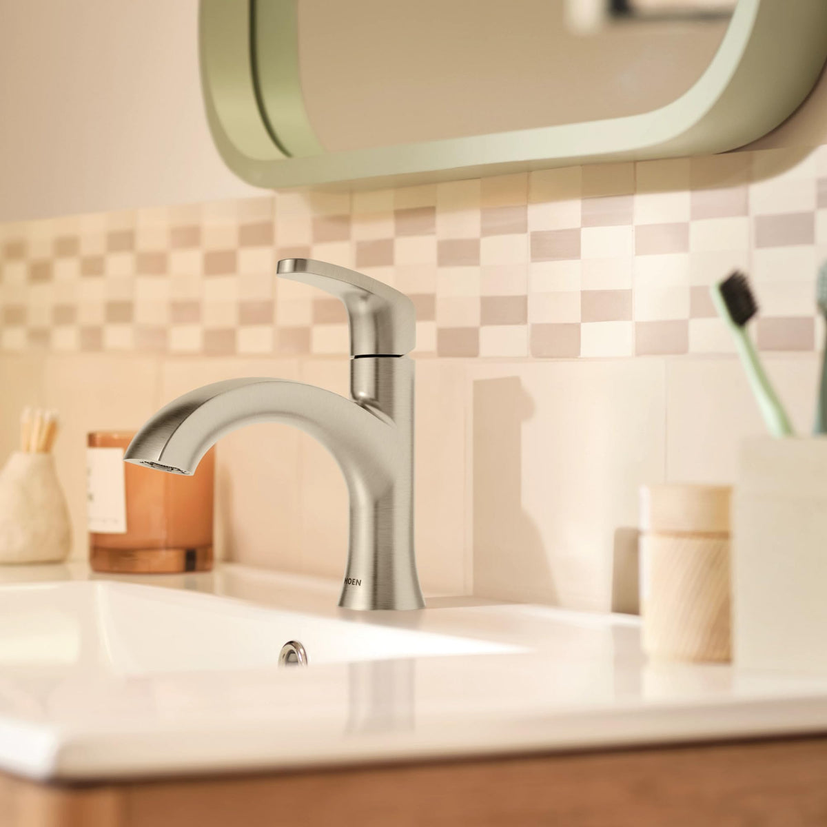 Moen Karis single-hole installation with optional deck plate offers flexible mounting options.