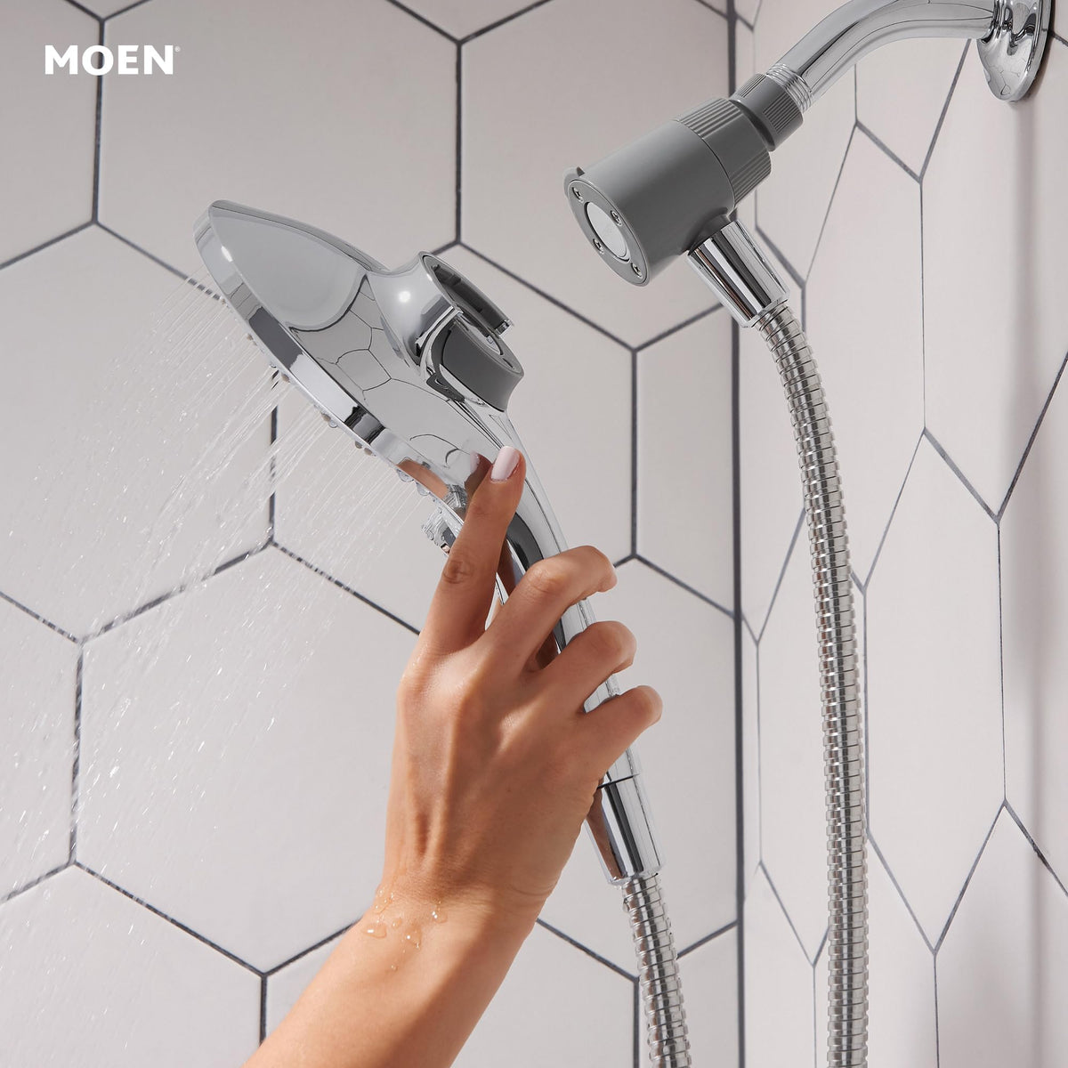 Moen Magnetic docking keeps shower head secure after detachment.