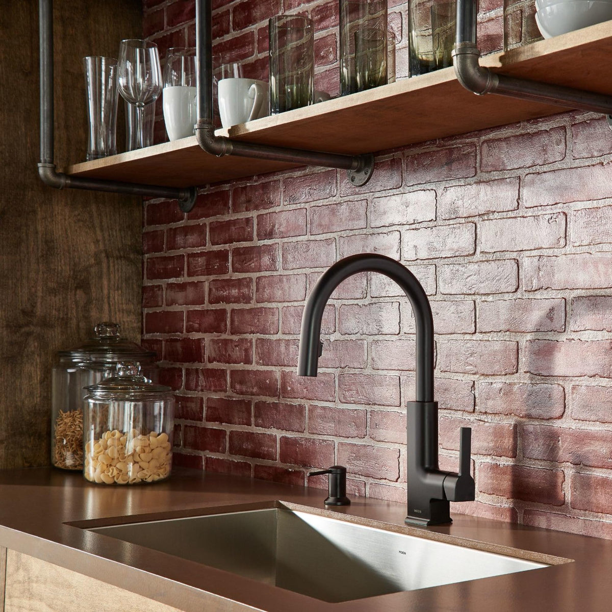 Moen dispenser side profile showcasing slim, modern silhouette and finish.