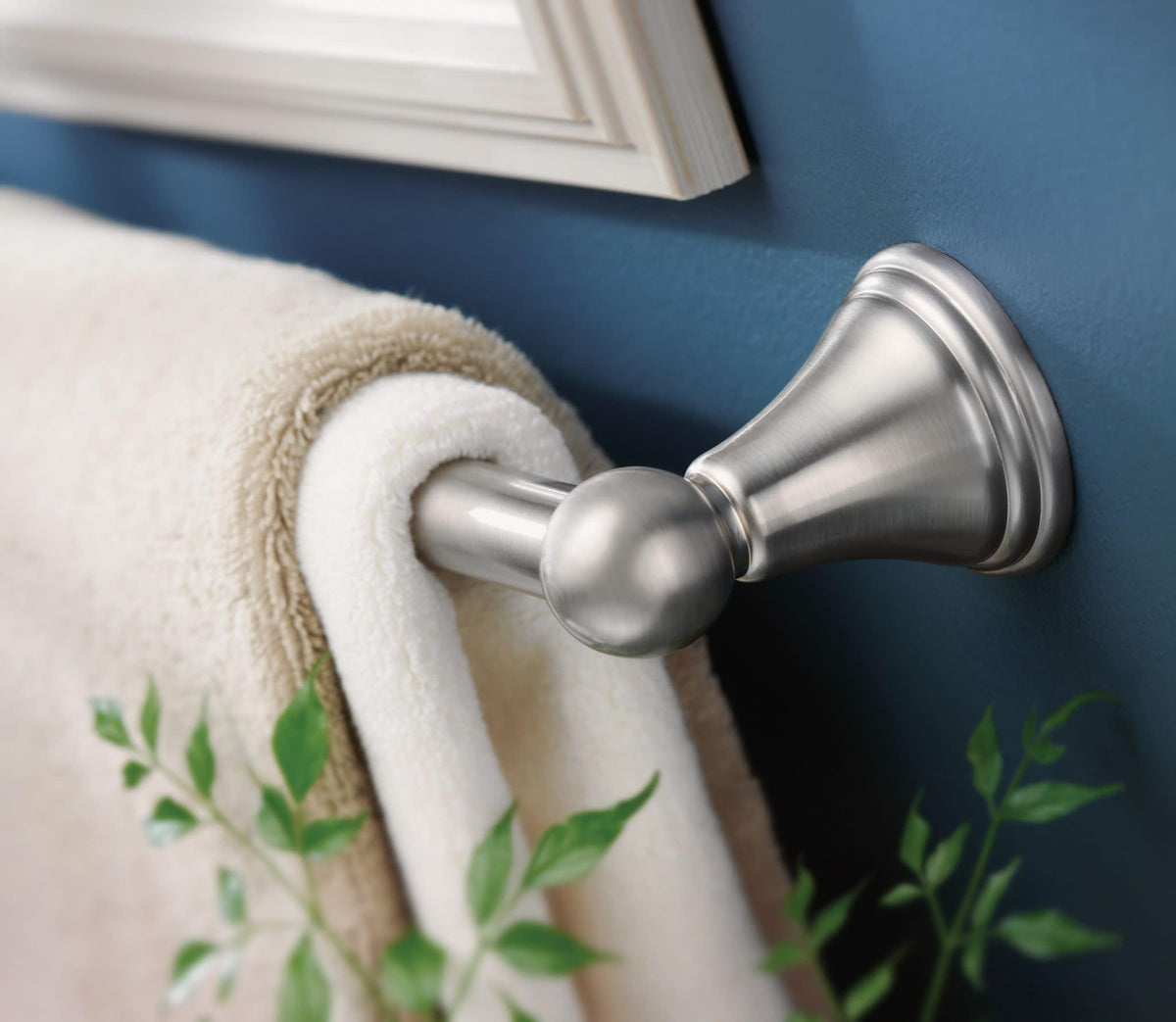 Brushed nickel finish Moen Preston towel bar resists corrosion