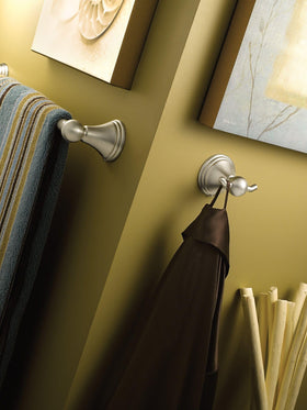 Wall-mounted Moen Preston towel bar in brushed nickel for accessible towels