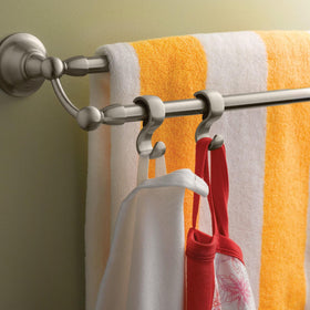 Two towel rods in use maximize towel storage and easy access.