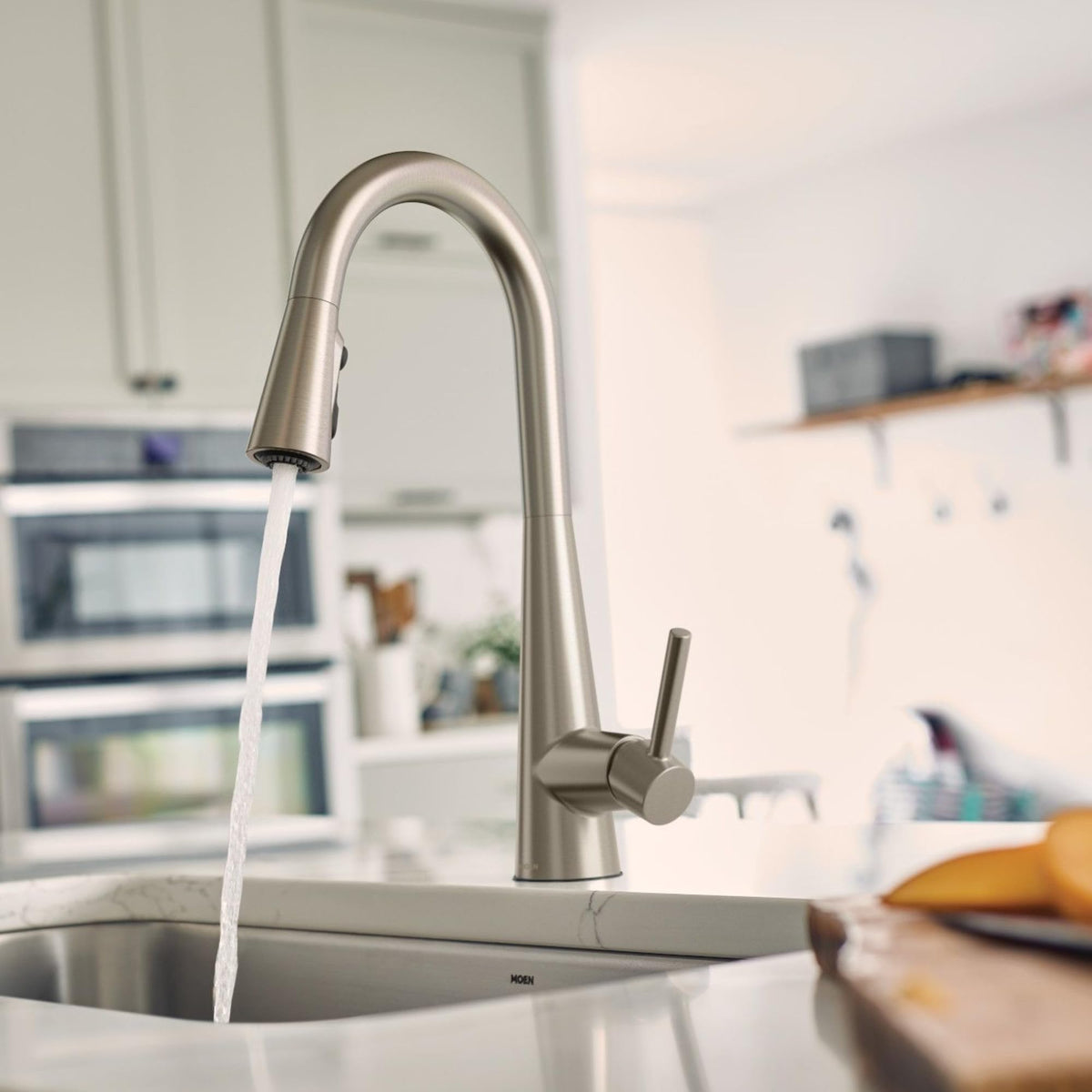 Moen Sleek deckplate included for a seamless countertop look