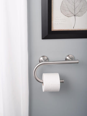 Stainless steel Moen grab bar complements bathroom with durable build