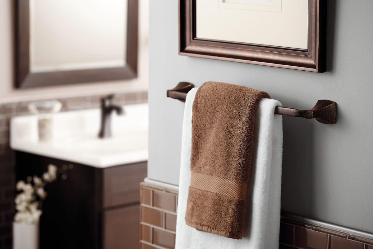 Close-up of Moen Voss brushed nickel finish detail with warm tone
