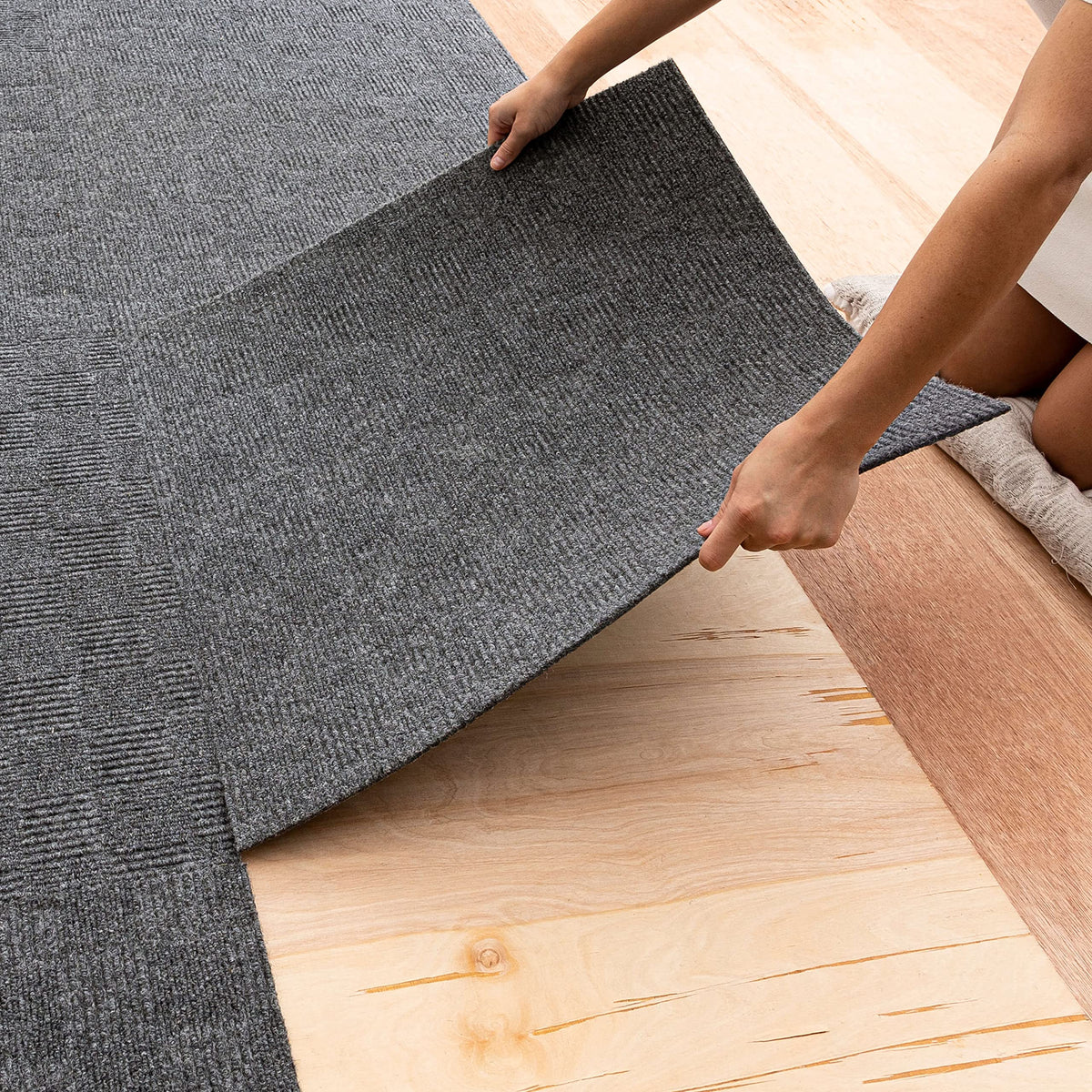 Mohawk Home peel-stick carpet tile in grey for fast, versatile DIY installation.
