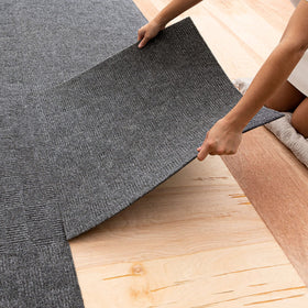 Mohawk Home peel-stick carpet tile in grey for fast, versatile DIY installation.