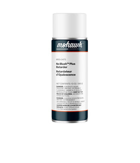 Applying Mohawk No-Blush Plus Retarder spray can to a wooden surface to reflow lacquer.