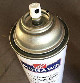 Mohawk pre-catalyzed clear finish satin aerosol can illustrates easy, even spray for quick touch-ups.