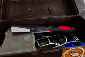 MoJack deck scraper handles silicone cleanup on stubborn residue.