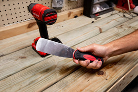 MoJack stainless steel blade demonstrates durability for tough deck scraping tasks.