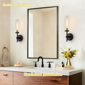 Two sconces installed in up or down orientation on hallway wall