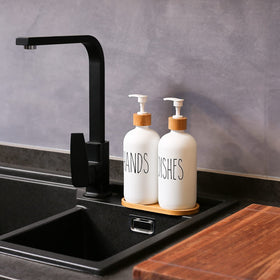 MOMEEMO white dish soap dispenser with pump keeps counters tidy.